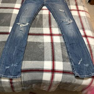 Distressed Blue Jeans